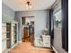 Cozy dining area with hardwood floors and adjacent kitchen at 4747 S Elati St, Englewood, CO 80110