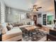 Spacious living room with hardwood floors, neutral paint, and lots of natural light at 4747 S Elati St, Englewood, CO 80110