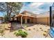 Spacious backyard boasts a covered patio, landscaping, and mature trees at 5925 E Fair Ave, Centennial, CO 80111