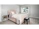 Charming bedroom with soft colors, plush headboard, and cozy decor at 5925 E Fair Ave, Centennial, CO 80111