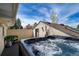 Hot tub on an upper level deck with privacy wall at 5925 E Fair Ave, Centennial, CO 80111