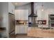 Well-equipped kitchen with stainless appliances, granite counters, and modern cabinetry at 5925 E Fair Ave, Centennial, CO 80111