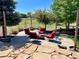 Cozy outdoor patio area with comfortable seating, perfect for relaxing and entertaining guests at 690 Antelope Dr, Bennett, CO 80102