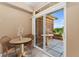 Inviting patio with stylish tables and chairs, perfect for outdoor dining and relaxation at 6418 Silver Mesa Dr # C, Highlands Ranch, CO 80130