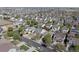 Desirable neighborhood showcases tree-lined streets and varied home styles in a peaceful residential setting at 13931 E 104Th Dr, Commerce City, CO 80022