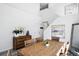 Dining room featuring neutral paint, hardwood floors, and natural light at 13931 E 104Th Dr, Commerce City, CO 80022