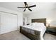 Inviting main bedroom with a cozy bed, nightstands, and soft lighting, creating a relaxing atmosphere at 13931 E 104Th Dr, Commerce City, CO 80022