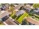 Aerial view of home on a well-maintained lawn at 6369 W 69Th Ave, Arvada, CO 80003
