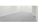 Spacious finished basement with gray carpeting and neutral walls at 6369 W 69Th Ave, Arvada, CO 80003
