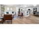 Open-concept living area with modern decor and seamless flow to the kitchen at 6369 W 69Th Ave, Arvada, CO 80003