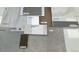 Selection of modern home materials, featuring cabinet color, carpet, LVP floors, tile walls and accents, and matching countertops at 24207 E 53Rd Dr, Aurora, CO 80019