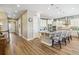 Bright kitchen featuring a large island with seating and stainless steel appliances at 7743 S Quantock Way, Aurora, CO 80016