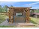 Hot tub inside of a wooden gazebo on a deck with views of the landscape at 9745 Hilldale Dr, Morrison, CO 80465