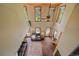 Grand living room features high ceilings, many windows, and comfortable leather seating at 9745 Hilldale Dr, Morrison, CO 80465