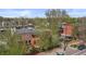 Aerial view of the property and neighborhood with mature trees showcasing a vibrant community at 1717 E 22Nd Ave, Denver, CO 80205