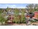 A picturesque aerial view of the property showing its landscaping, and neighborhood streets at 1717 E 22Nd Ave, Denver, CO 80205