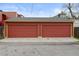 Two-car garage with large doors, offering ample parking and storage space in the rear at 1717 E 22Nd Ave, Denver, CO 80205