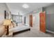 Bright main bedroom with plenty of natural light, ceiling fan, and light gray walls at 1717 E 22Nd Ave, Denver, CO 80205
