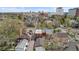 Charming street view showcases tree-lined roads with diverse architecture and a vibrant cityscape backdrop on a sunny day at 1717 E 22Nd Ave, Denver, CO 80205