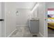 Bathroom showcasing updated vanity with double sinks and a shower at 8506 Eaton St, Arvada, CO 80003