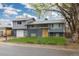 Charming two-story home with a well-manicured front yard and a two car garage at 8506 Eaton St, Arvada, CO 80003