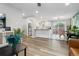 Open-concept living area seamlessly connecting to the modern kitchen and dining space at 8506 Eaton St, Arvada, CO 80003