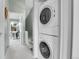 Laundry area with a stackable washer and dryer at 9615 W Chatfield Ave # C, Littleton, CO 80128