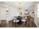 Elegant dining room and living space with modern décor, a chandelier, and stylish seating at 4500 Zephyr St, Wheat Ridge, CO 80033