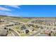 Aerial view of a residential community with mountain views and a blue sky at 2516 Mountain Sky Dr, Castle Rock, CO 80104