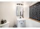 Modern half bathroom with updated fixtures and stylish decorative accents at 2516 Mountain Sky Dr, Castle Rock, CO 80104