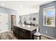 Kitchen island and stainless appliances with a view into the dining room at 2516 Mountain Sky Dr, Castle Rock, CO 80104