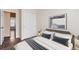 Bedroom offers hardwood floors, a window, decor and closet at 1639 S Ivory Cir # C, Aurora, CO 80017