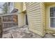 Exterior patio with sliding door and wooden fence for privacy and outdoor enjoyment at 1639 S Ivory Cir # C, Aurora, CO 80017