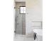 Beautiful bathroom featuring a glass enclosed shower and a soaking tub with subway tile at 1680 S Humboldt St, Denver, CO 80210