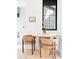 Cozy breakfast nook with a round table, comfortable chairs, and a bright window at 1680 S Humboldt St, Denver, CO 80210