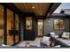 Inviting covered patio with stylish outdoor furniture and views of the home's interior at 1680 S Humboldt St, Denver, CO 80210
