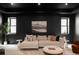 Comfortable living room featuring large sectional and neutral decor at 1680 S Humboldt St, Denver, CO 80210