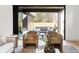 Inviting indoor-outdoor space with a comfortable seating area and sliding glass doors to the patio at 1680 S Humboldt St, Denver, CO 80210