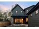 Contemporary two-story home with a large sliding glass door that opens to a patio at 1680 S Humboldt St, Denver, CO 80210