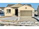 Charming single-story home featuring a two-car garage and neutral exterior at 17569 Cerberus Ct, Monument, CO 80132