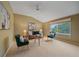 Cozy living room with vaulted ceiling, large window, and neutral decor at 9869 Burberry Way, Highlands Ranch, CO 80129