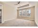 Bright main bedroom featuring carpet floors and a ceiling fan at 14952 Vienna Cir, Parker, CO 80134