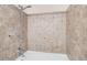 Bathroom with shower/tub combo and tile surround at 15800 E 121St Ave # 3J, Brighton, CO 80603
