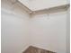 Spacious walk-in closet offering ample storage with white walls and carpeted floors at 15800 E 121St Ave # 3J, Brighton, CO 80603