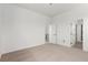 Bedroom with neutral carpet, recessed lighting and multiple windows at 5785 N Jericho Way, Aurora, CO 80019