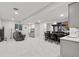 Finished basement featuring a wet bar, home theater with a large screen tv, and gray sofa at 11025 Watermark St, Parker, CO 80134