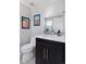 Charming bathroom features stylish artwork and a modern vanity, complemented by contemporary fixtures and a clean design at 11025 Watermark St, Parker, CO 80134