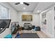 Finished room featuring a home gym setup and a large screen tv at 11025 Watermark St, Parker, CO 80134