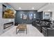 Finished basement featuring a home theater with a fireplace, large screen tv, and leather seating at 11025 Watermark St, Parker, CO 80134