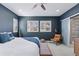 Stylish main bedroom with large windows, ceiling fan and carpet flooring at 11025 Watermark St, Parker, CO 80134